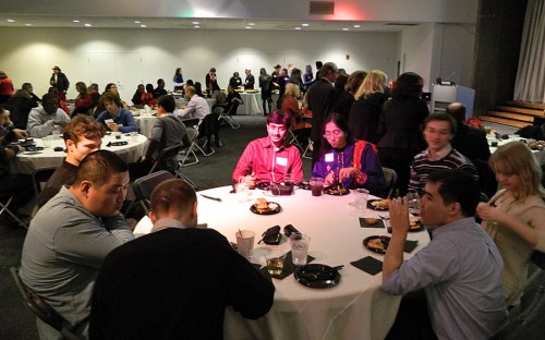 Students, scholars, alumni and guests enjoying the event