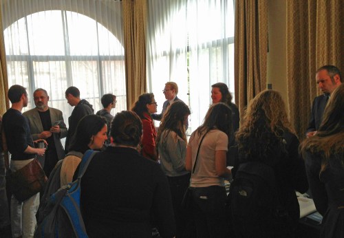 Students, alumni and guests at the information fair prior to the panel discussion