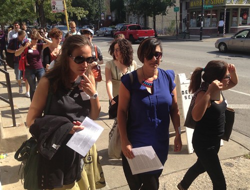 Students and scholars walking on Pilsen streets on a beautiful fall day