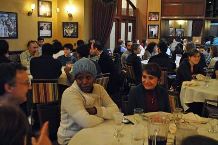 Board member Ana Gil-García sharing a table with Fulbrighters