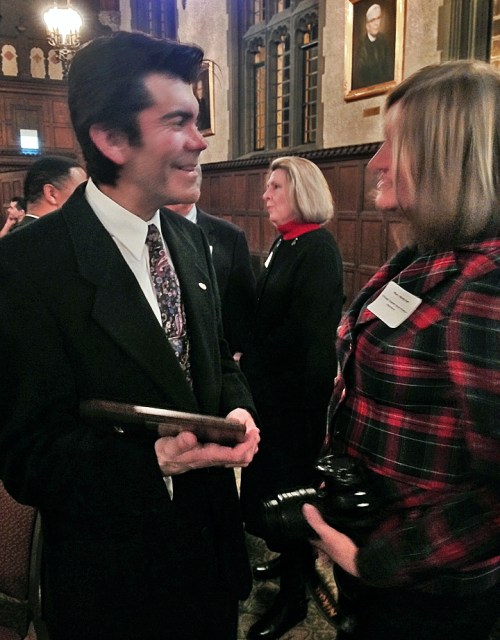 Elio Leturia talks to Chicago Chapter board member Mary Mares-Awe after being presented with the Dee Sarelas Service Award.