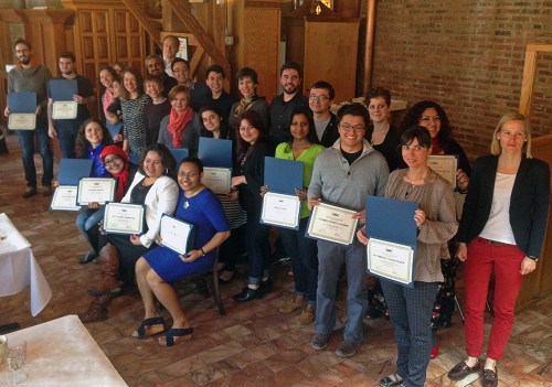 Fulbright students and scholars who have finished with their programs receive a certificate of completion by the Chicago Chapter of the Fulbright Association